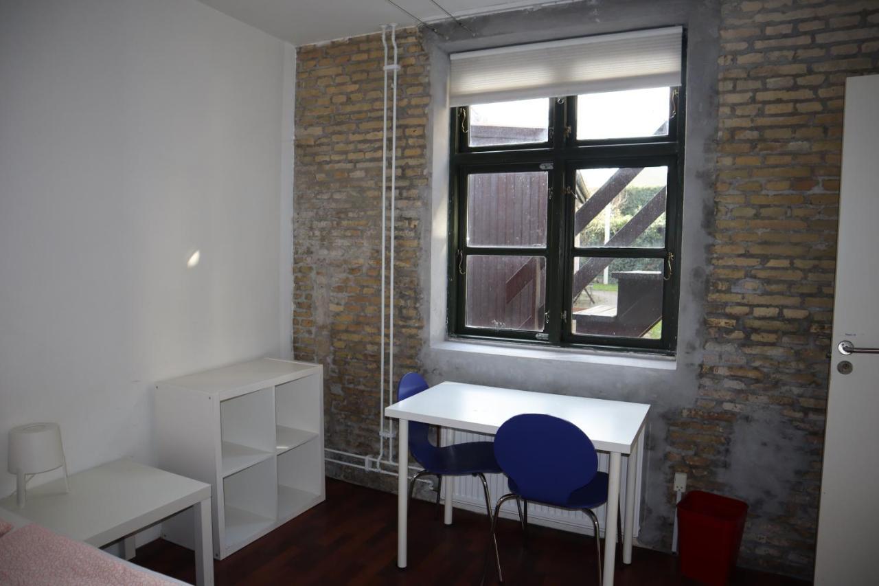 Charming Red Courtyard Apartment Kopenhagen Bagian luar foto